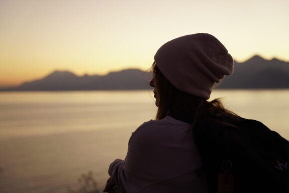 woman, outdoors, sunset, beanie, travel, thinking, looking, nostalgia, nature, dusk